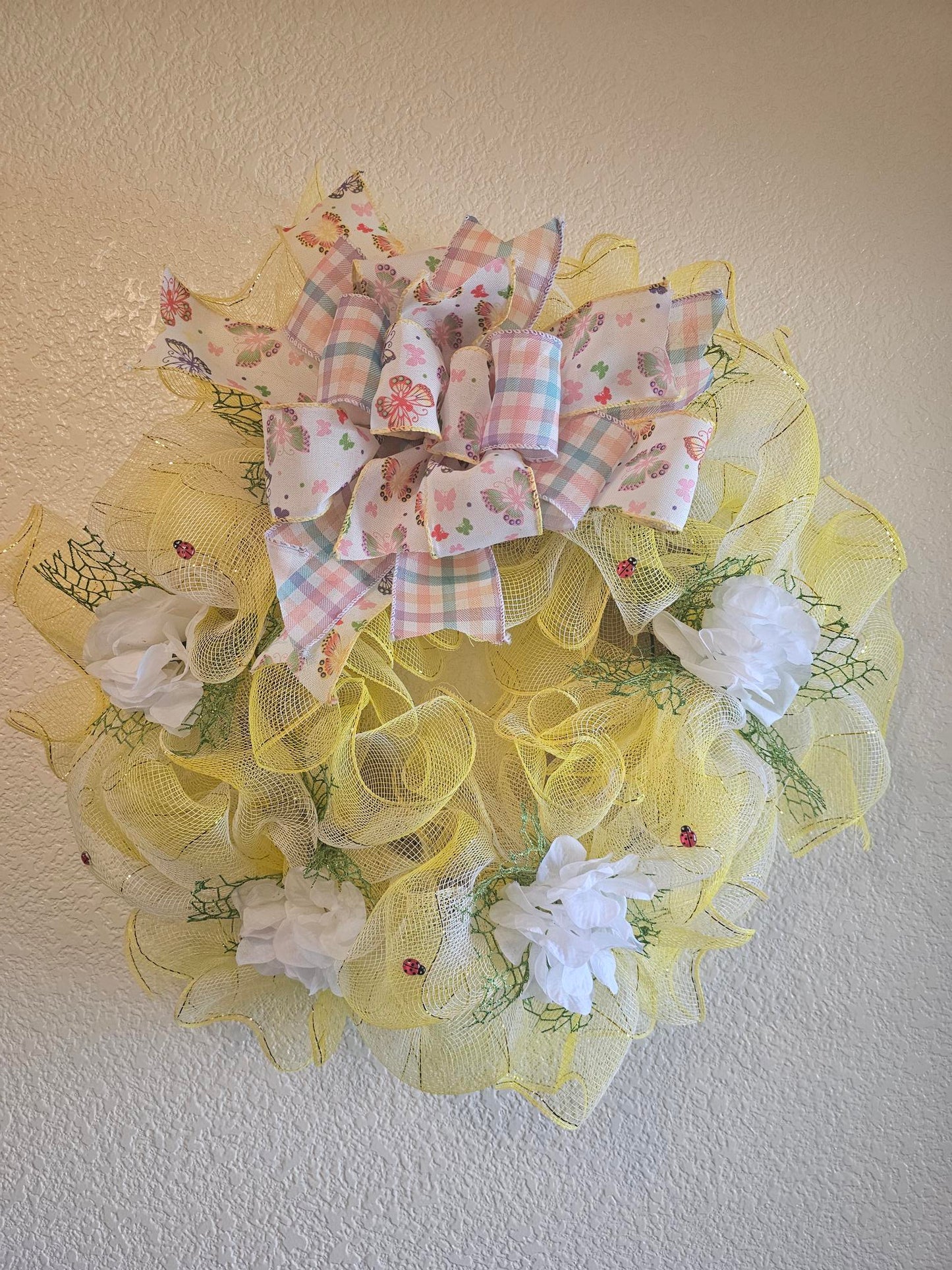 Whimsical yellow butterfly wreath