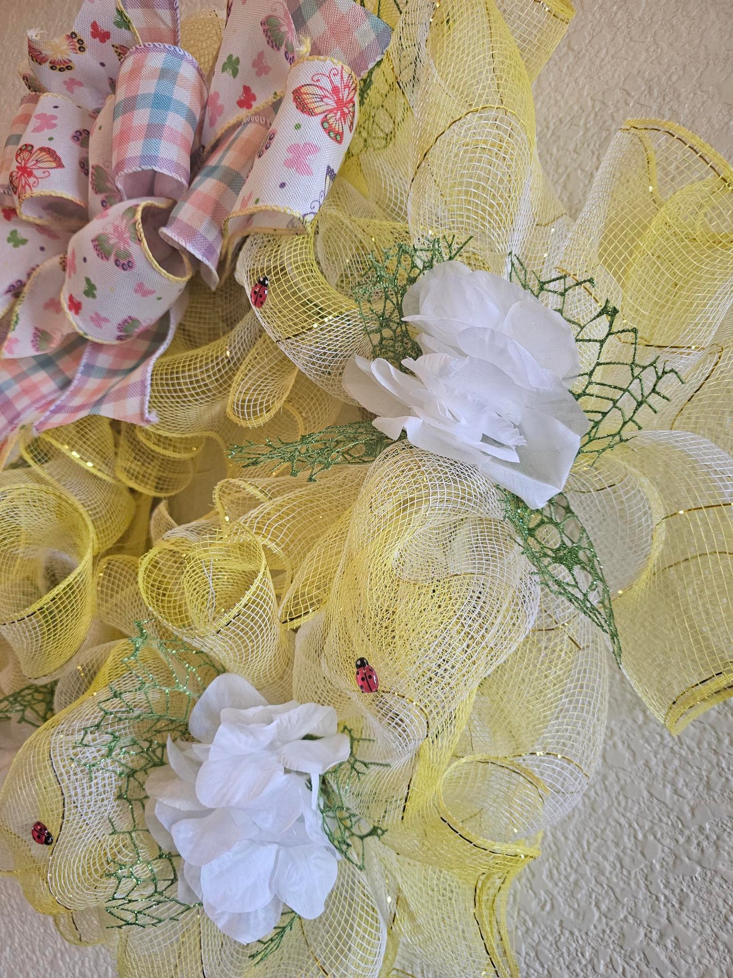 Whimsical yellow butterfly wreath