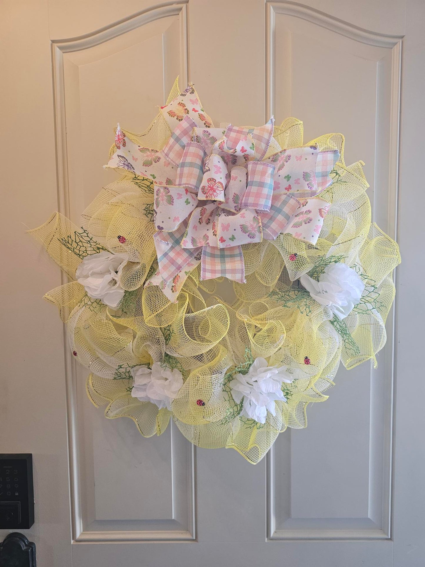 Whimsical yellow butterfly wreath