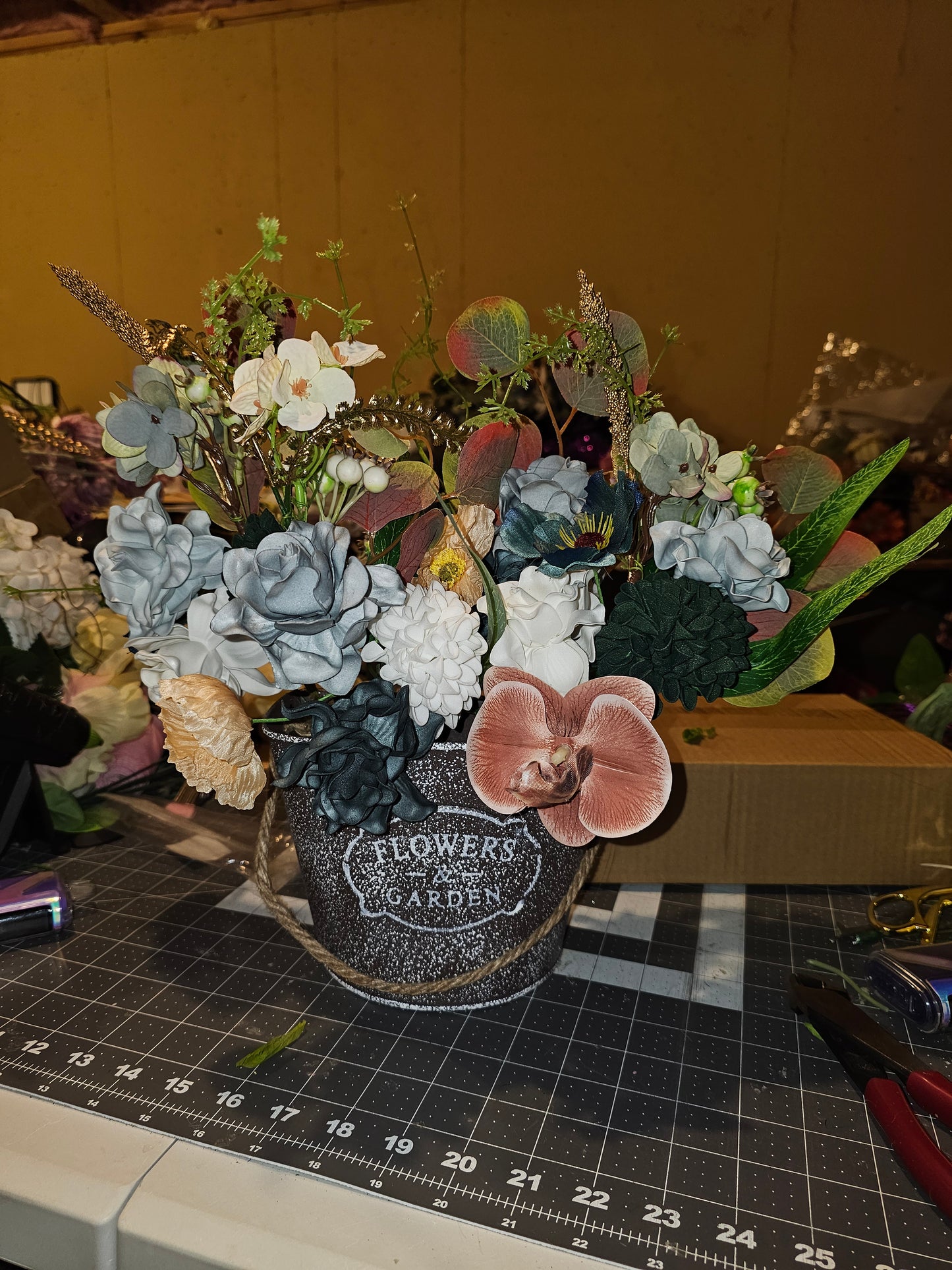 Neutral Floral Arrangement in Rustic Bucket
