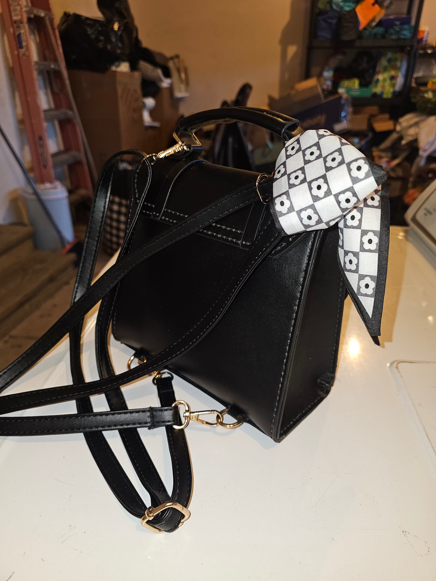 Black Structured Handbag with Floral Scarf