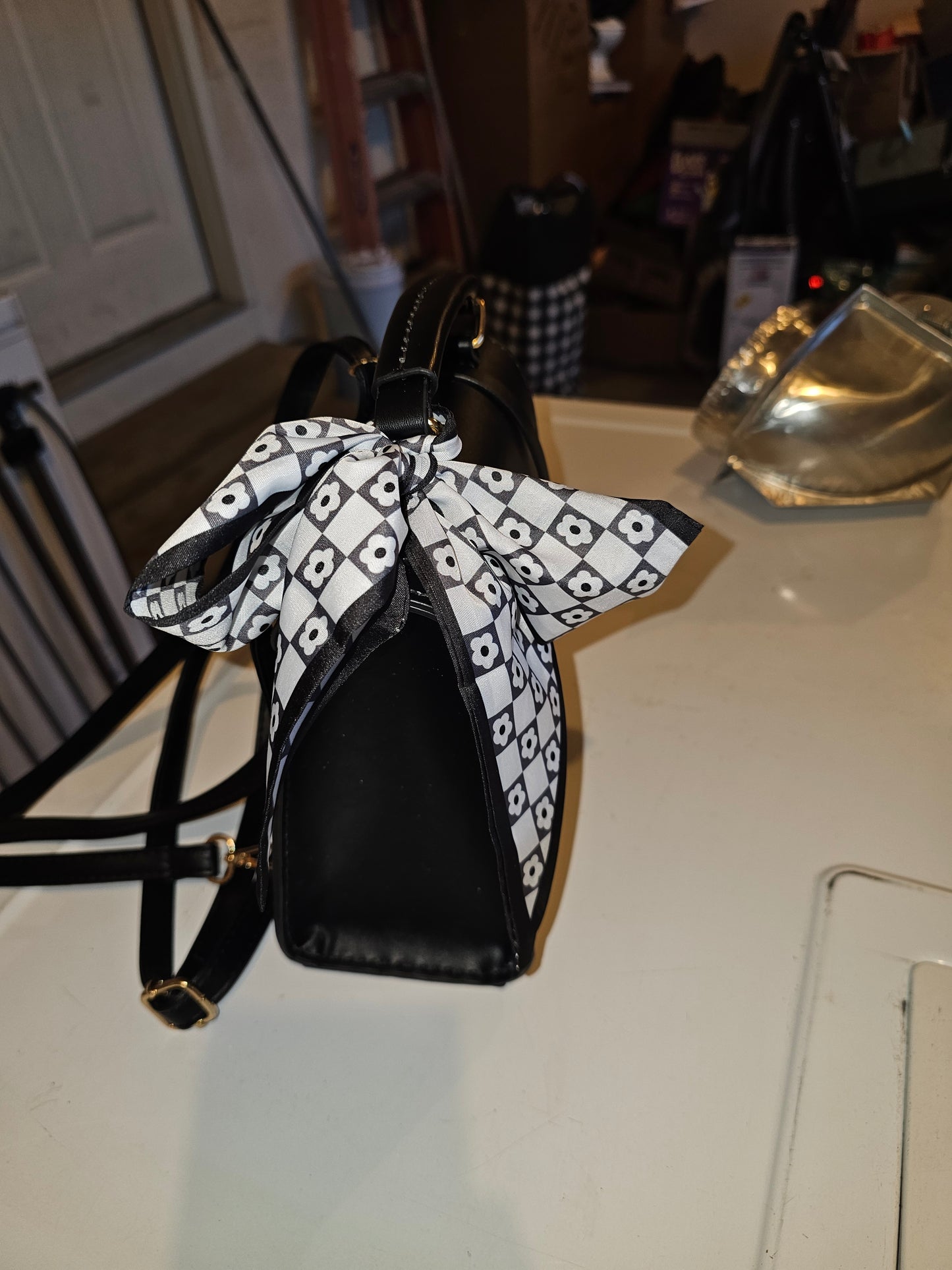 Black Structured Handbag with Floral Scarf